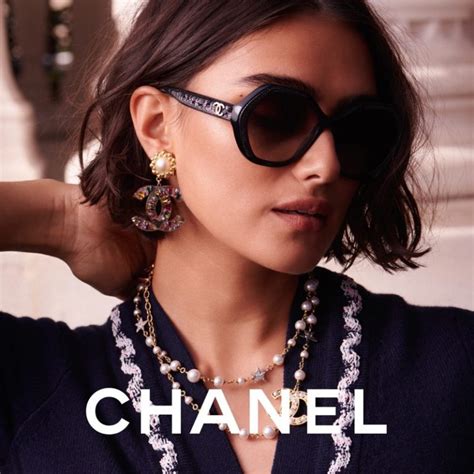 new chanel sunglasses on model|Chanel sunglasses with clear sides.